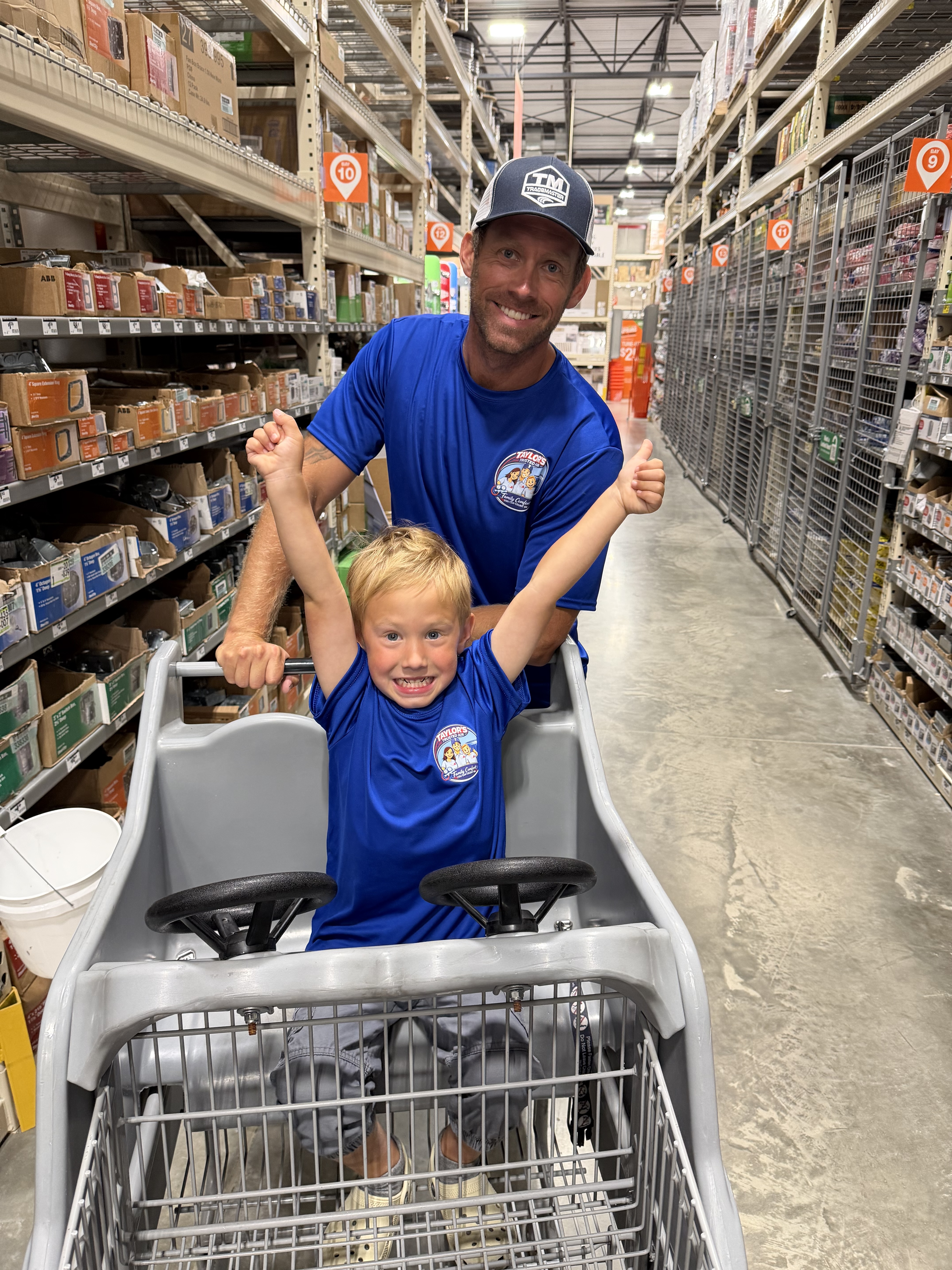 Taylor and son picking up supplies